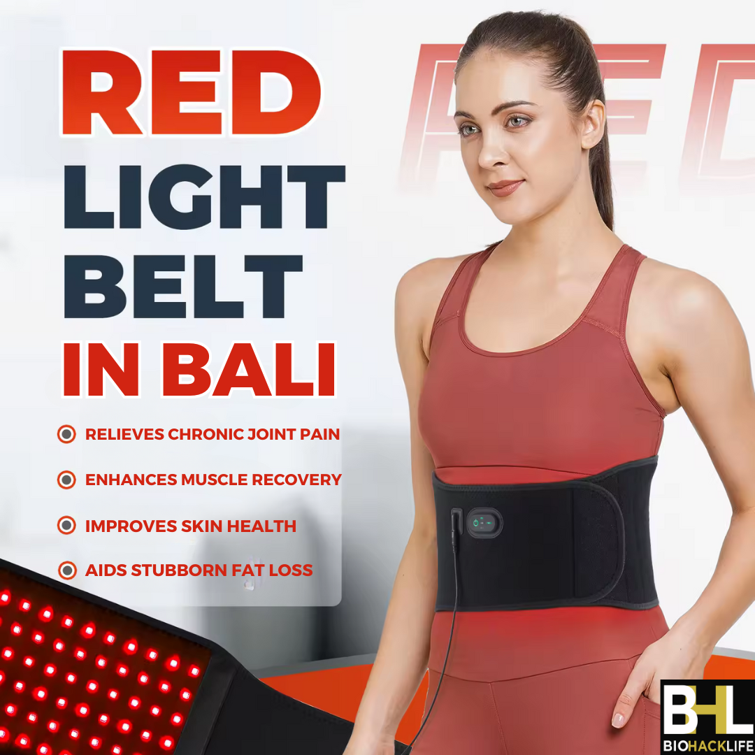A woman wearing a red light therapy belt wrapped around her waist